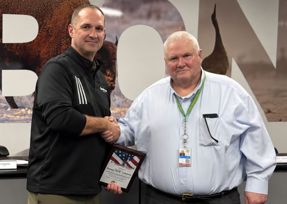 Captain Bob receiving the key to the city