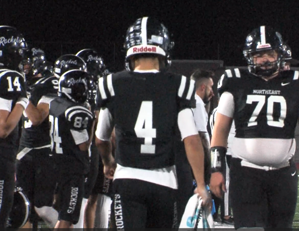 Lincoln Northeast's Zayne Scully walks along the sidelines in the team's 70-7 win over Lincoln Northwest.