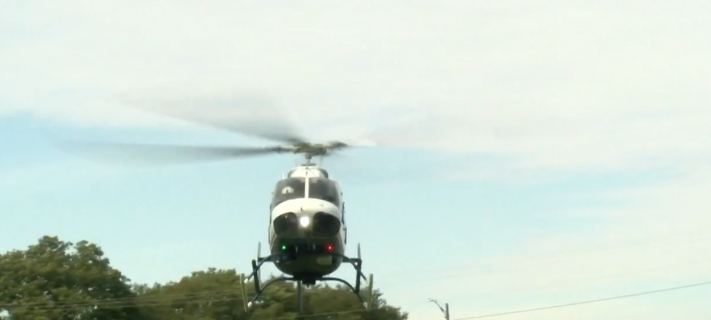 Helicopter landing on field