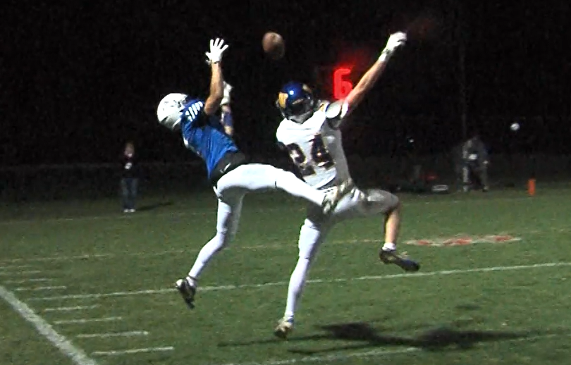 Wahoo's Joey Kelly makes a leaping block downfield against Ashland-Greenwood.