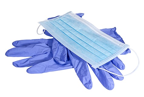 Medical Mask On The Blue Latex Gloves
