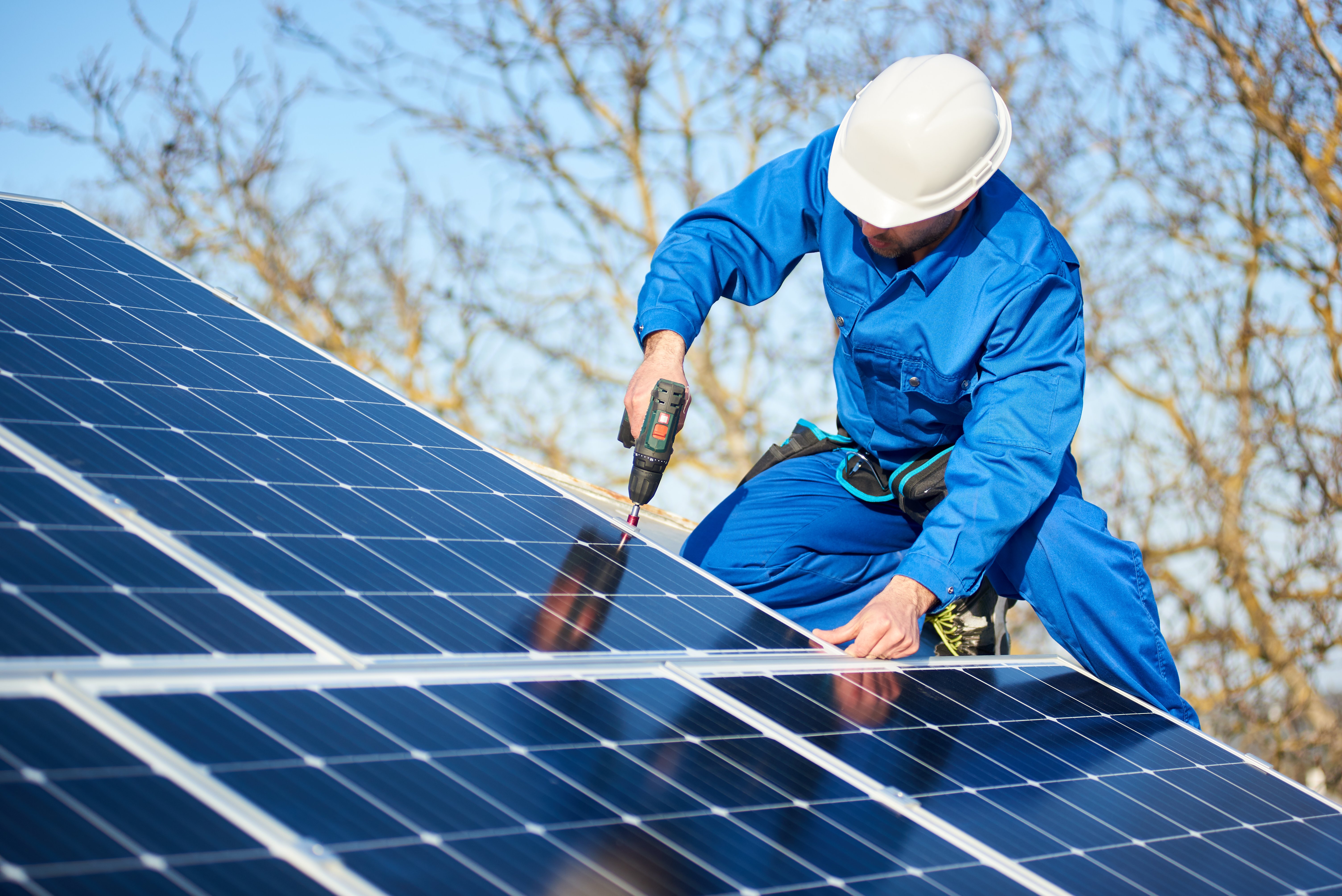 Two Engineers Installing Solar Panels On Roof Stock Photo - Download Image  Now - Solar Panel, Solar Energy, Solar Power Station - iStock