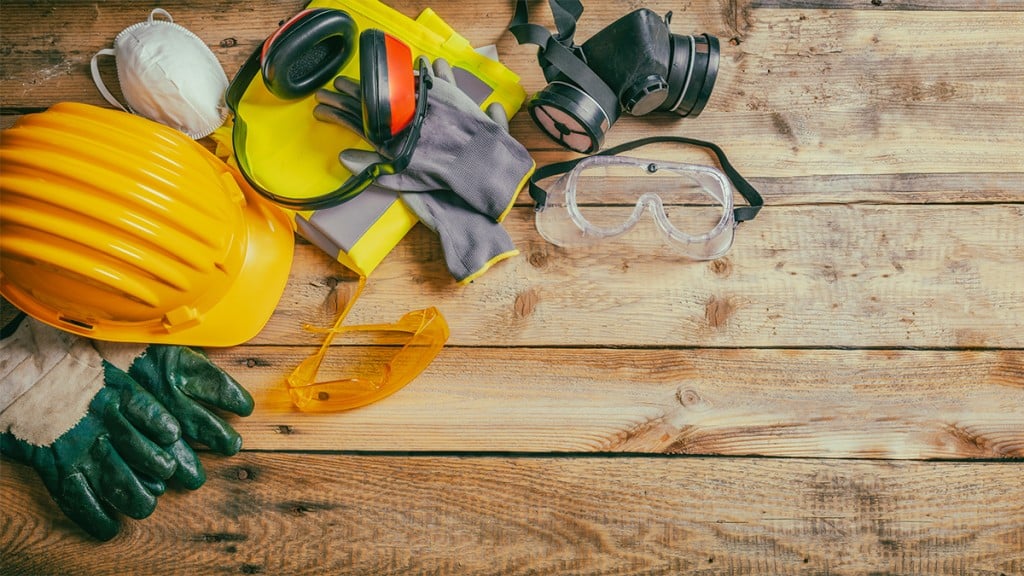 Construction Safety. Protective Hard Hat, Headphones, Gloves And Glasses On Wooden Background, Banner