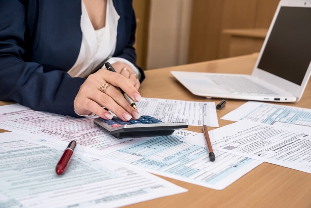 Woman Filling Us Tax Form