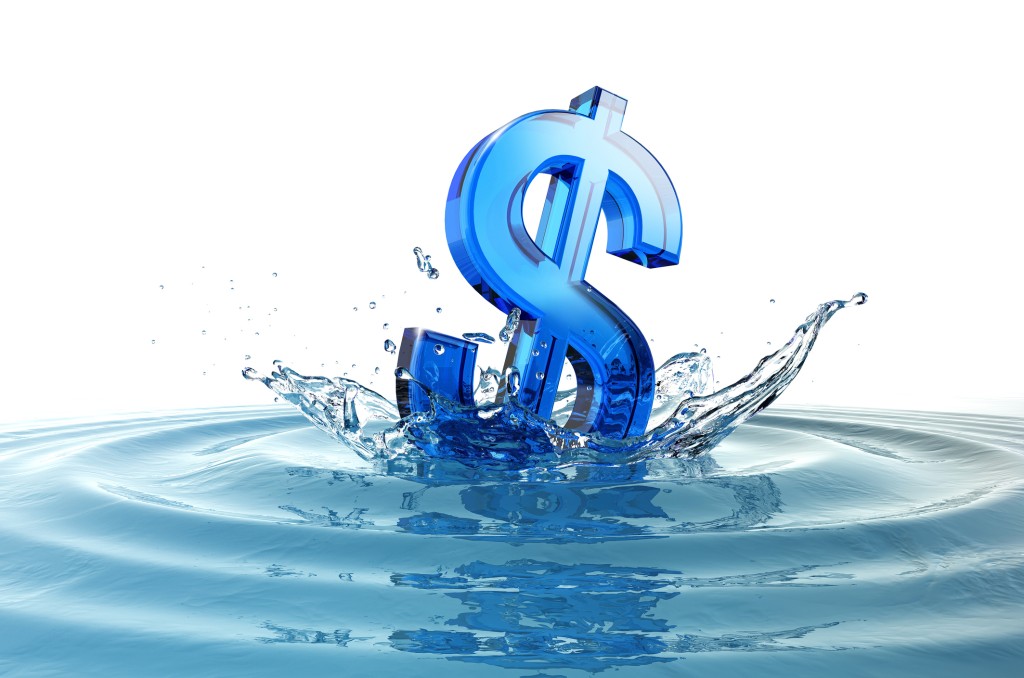 Us Dollar Sign Falling Into Water With Splash.