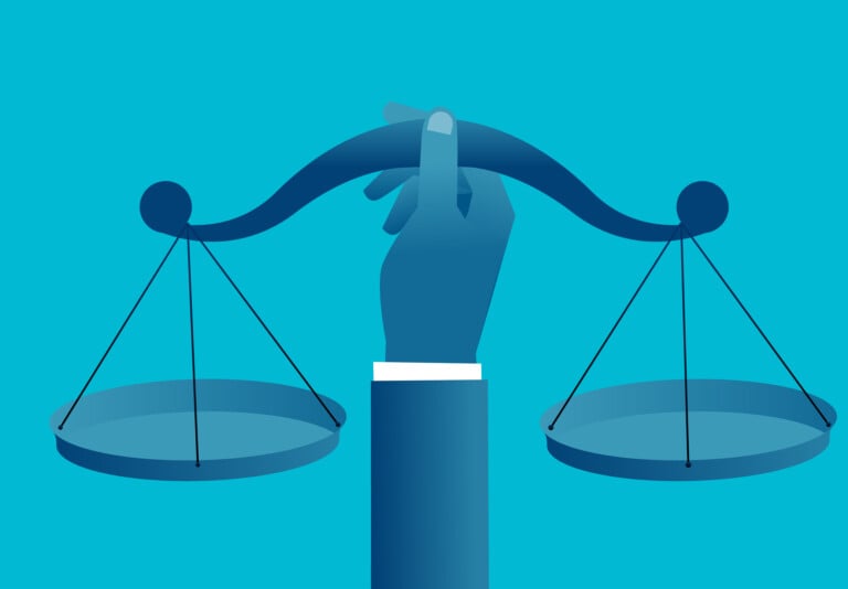 Hand Holding A Balance Balance Scale