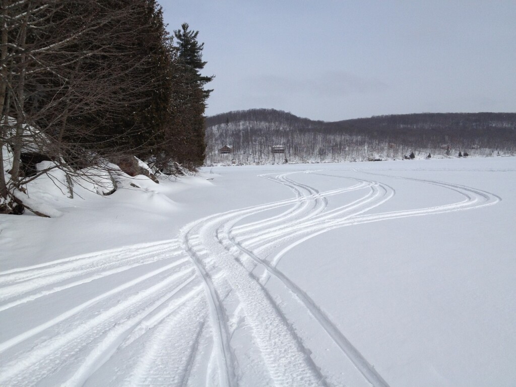 snowmobile tracks in snow