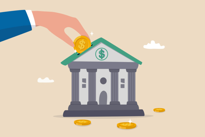 Investment Bank Financial Service To Provide Invest Advisory, Wealth Management Or Loan For Company, Money Growth Or Profit And Earning Concept, Businessman Hand Put Dollar Coin On Investment Bank.