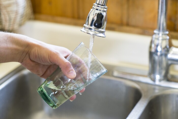 Filling A Water Glass From The Faucet