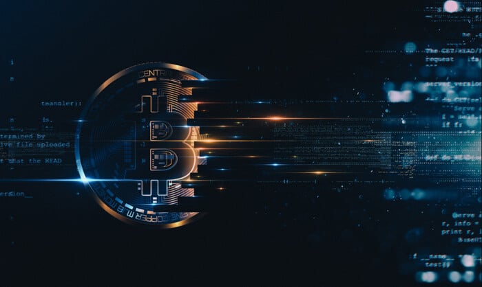 Bitcoin With Glowing Lights..gold Bitcoin Symbol. Coins On Black