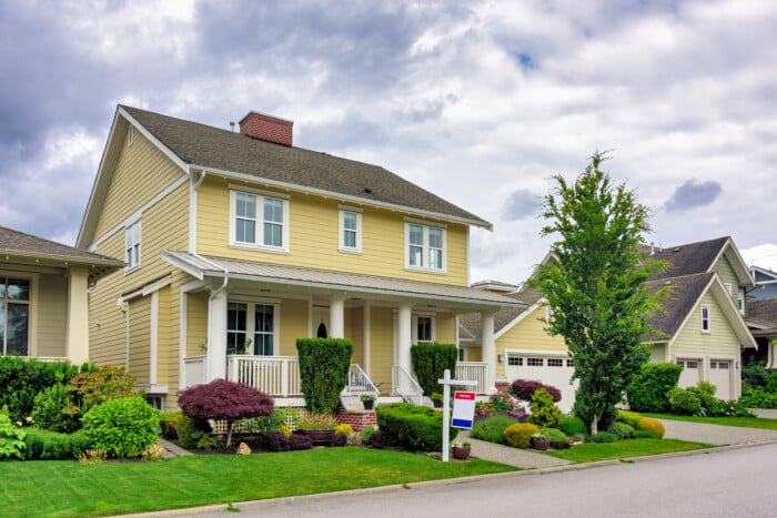 A Perfect Neighborhood. Nicely Landscaped Front Yard Of Luxury Residential House For Sale
