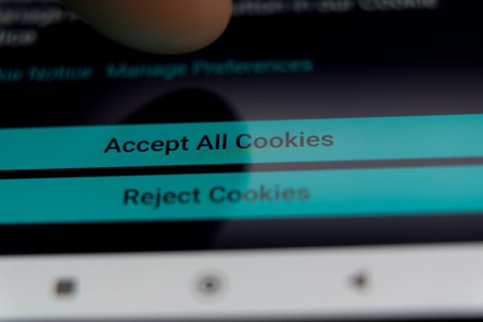 Close Up Of A Finger About To Press The Accept All Cookies Button On A Website Consent Banner, Illustrating Internet Privacy, User Data Tracking, And Gdpr Compliance.