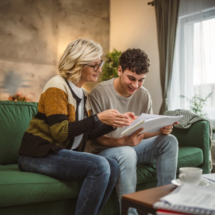 Student Caucasian Man Study With Help Of His Tutor Professor Or Mother