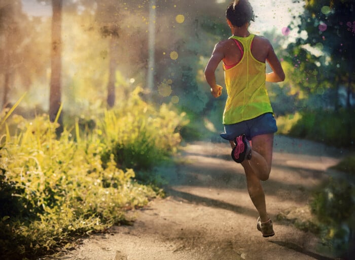 Fitness Young Woman Running On Morning Tropical Forest Trail