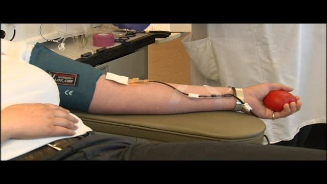 drawing blood from donor