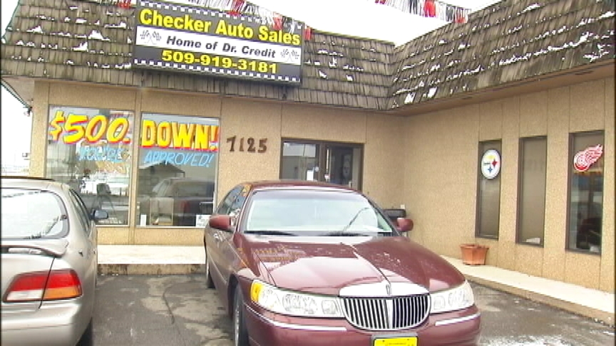 Car dealership owner surprised at police action during repossession attempt