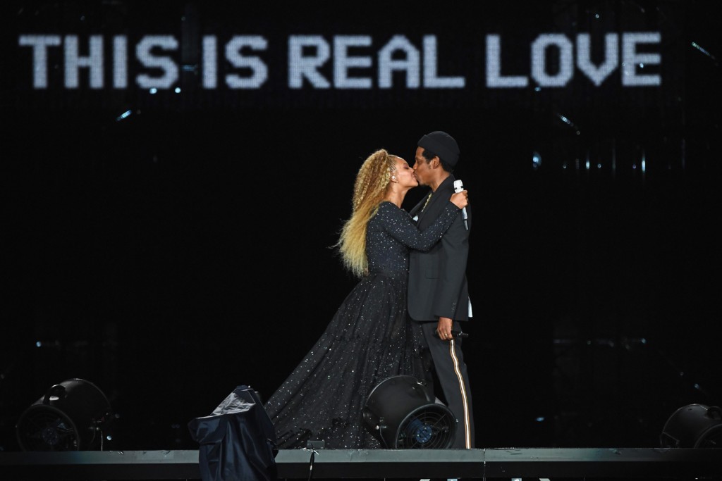 Beyonce and Jay-Z followed off stage by excited fan