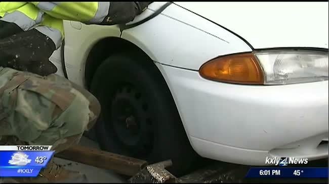 Abandoned and vandalized car in Kendall Yards towed away