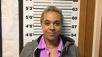 Woman accused of kidnapping local car dealer during test drive