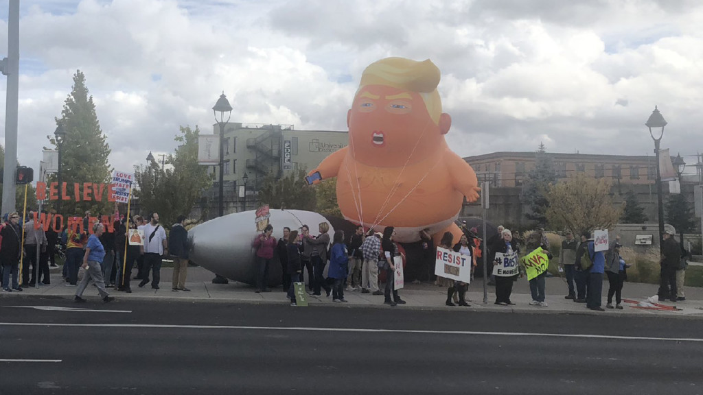 Baby Trump balloon flies in Spokane to protest Vice President Pence’s visit