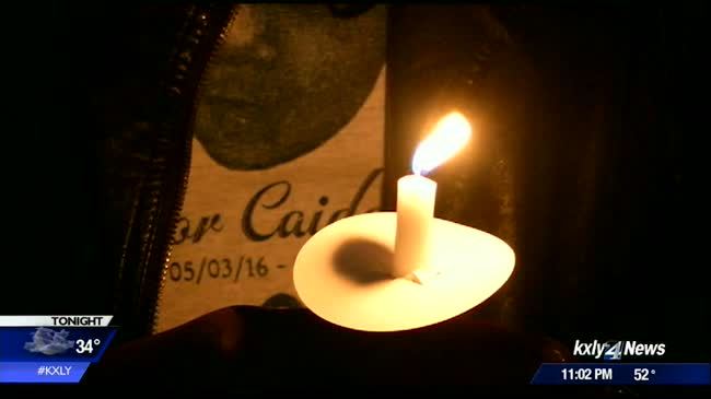 Candle light vigil honors little boy killed while in care of babysitter