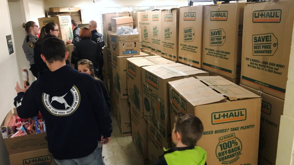 Coeur d’Alene Police Dept. fills moving truck with donated toys for sick kids