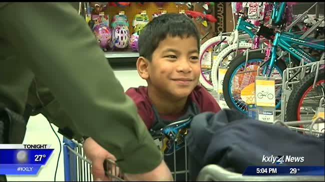 Children in need pair up with law enforcement to buy gifts for families