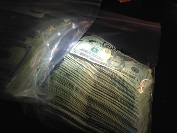 Police find heroin, $28,000 cash in Downtown Spokane drug bust