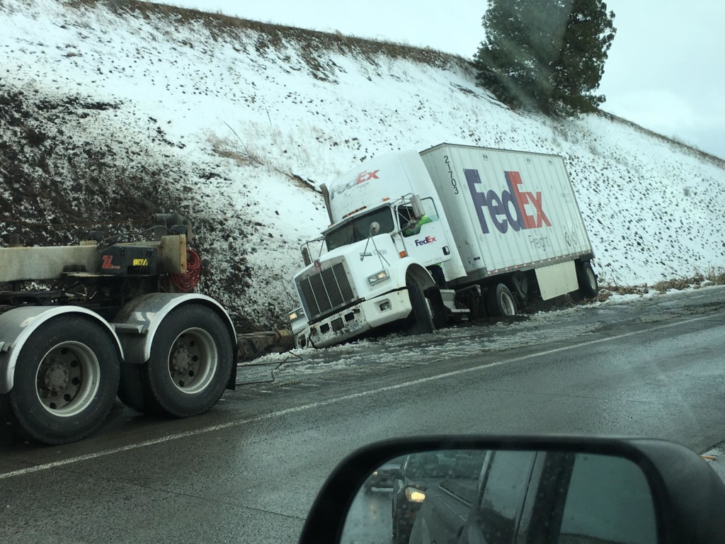 Winds knock FedEx truck into ditch on U.S. Route 195