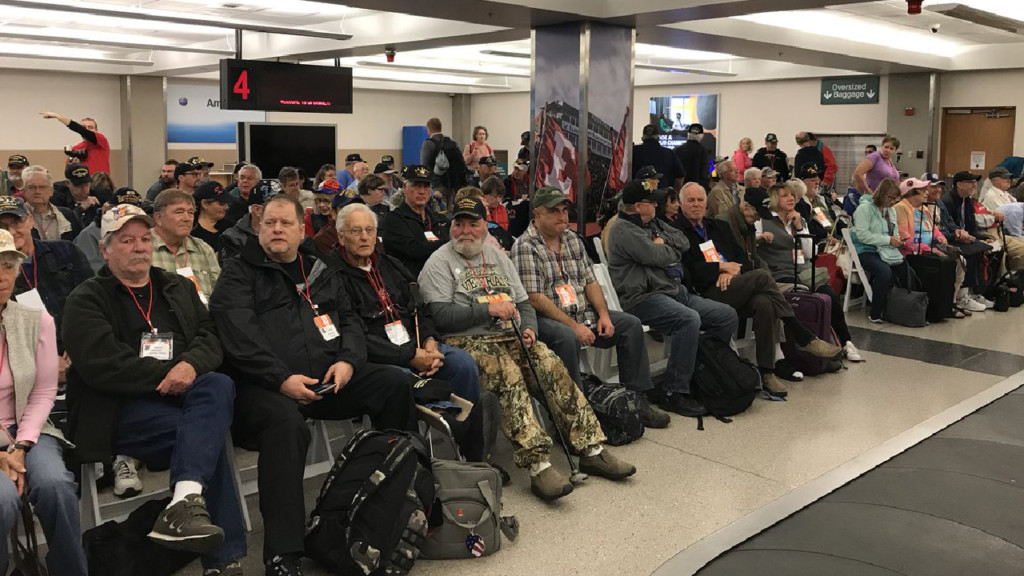 Over a hundred veterans depart Spokane International Airport on honor flight