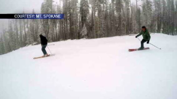 Skiers and snowboarders brave the rain for new chairlift, runs at Mt. Spokane