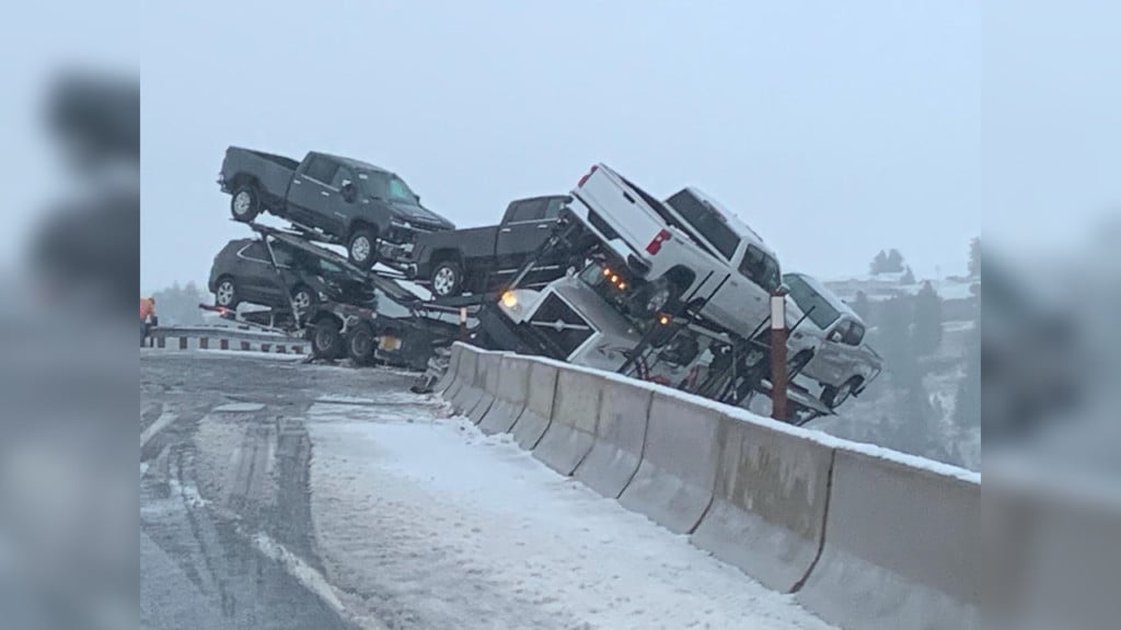 Semi carrying multiple cars teetering on side of Highway 195 near Colfax, driver out safe