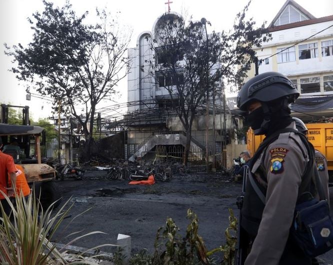 Police: Members of a family bombed 3 Indonesian churches