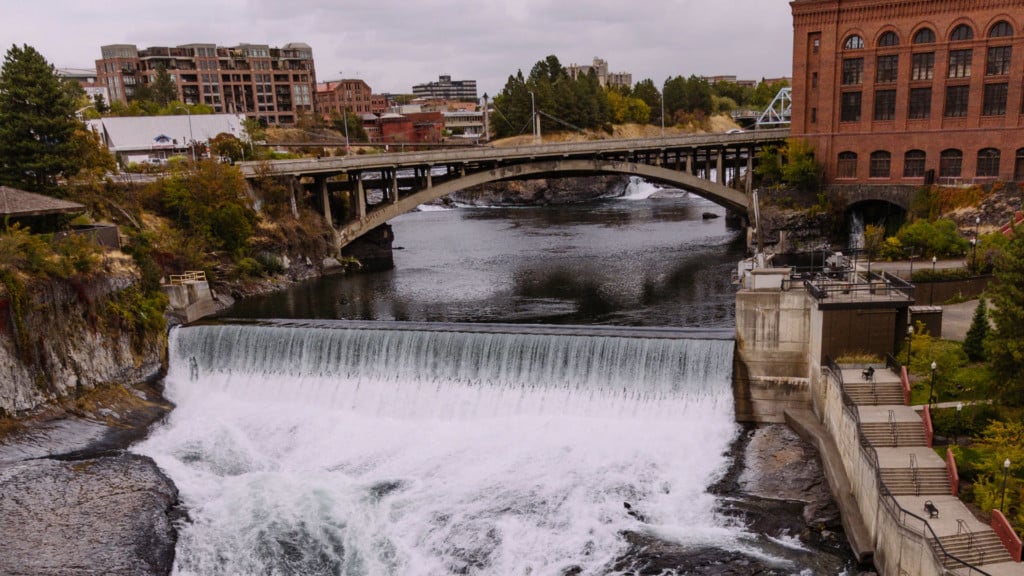 New plaza opens up on the Spokane River, houses overflow tank underneath it