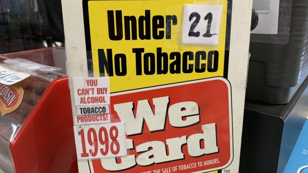 Tobacco sign changes to say no sales to anyone under 21