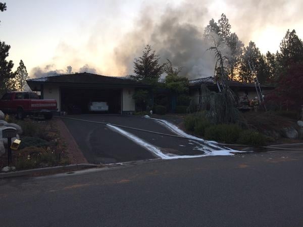 Smoke detectors helps family flee burning Spokane Valley home