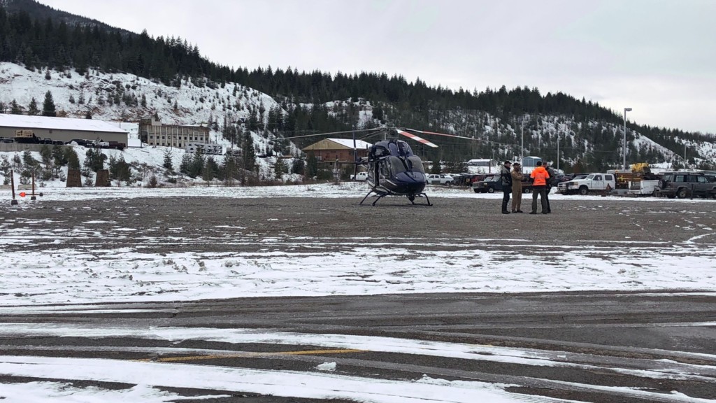 Rescuers search Silver Mountain by helicopter.