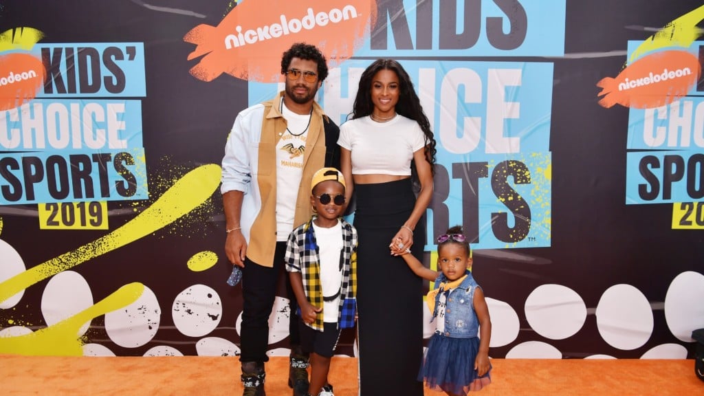 Russell Wilson, Ciara and their children on the orange carpet