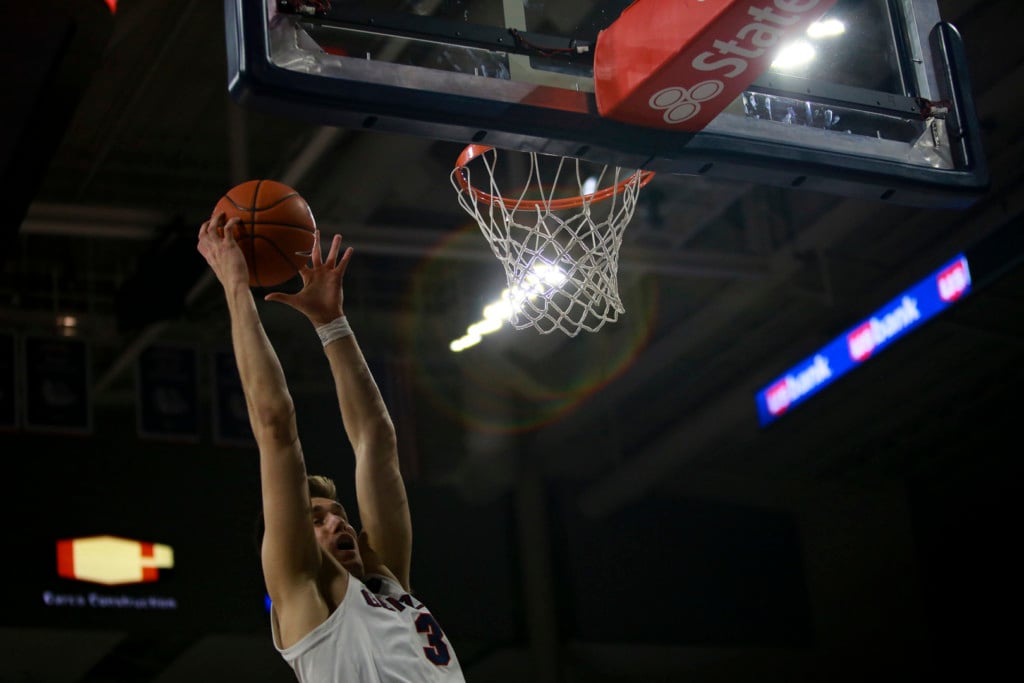 Gonzaga's Filip Petrusev with the two-handed slam against Pacific. Petrusev finished the night with 15 points.