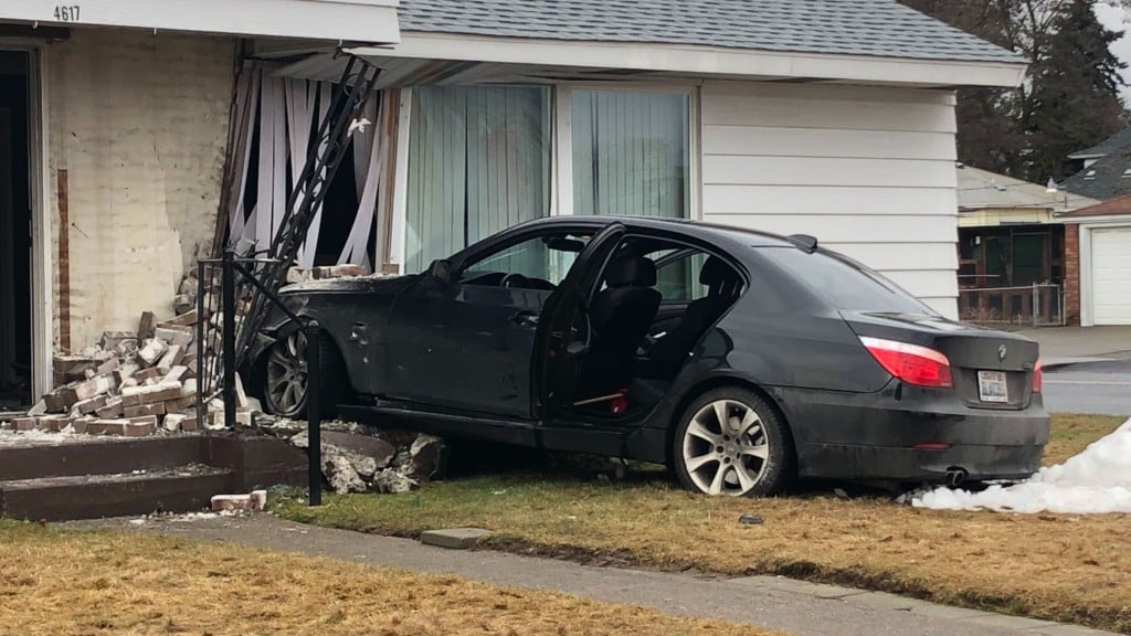 Car crashes into North Spokane home.