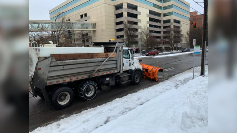 Snow plows hit Spokane streets