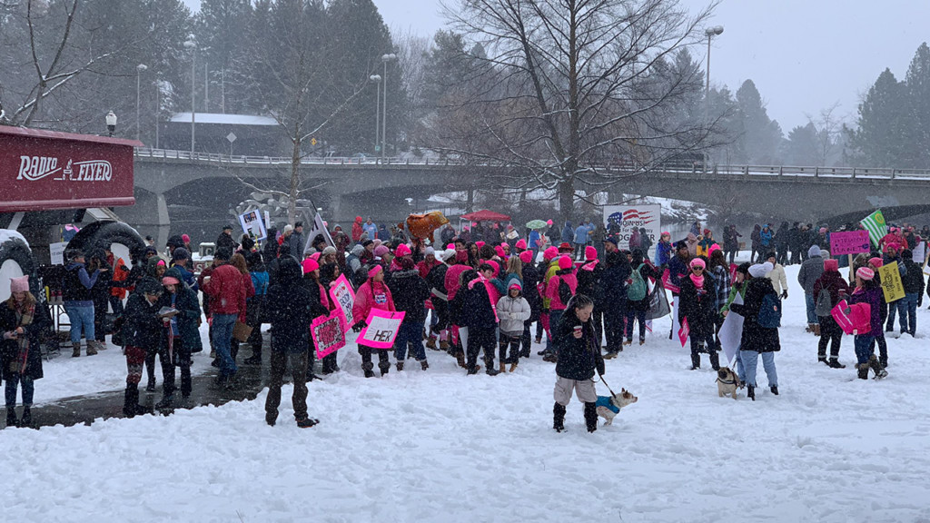 People gather for the fourth annual women's march