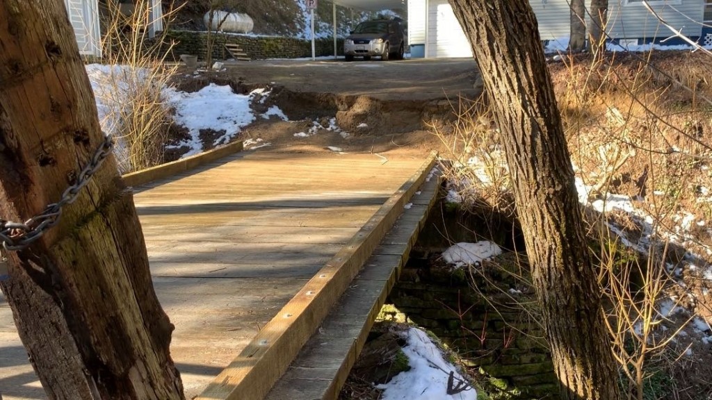 Judy Burke's private bridge in north Spokane gives way