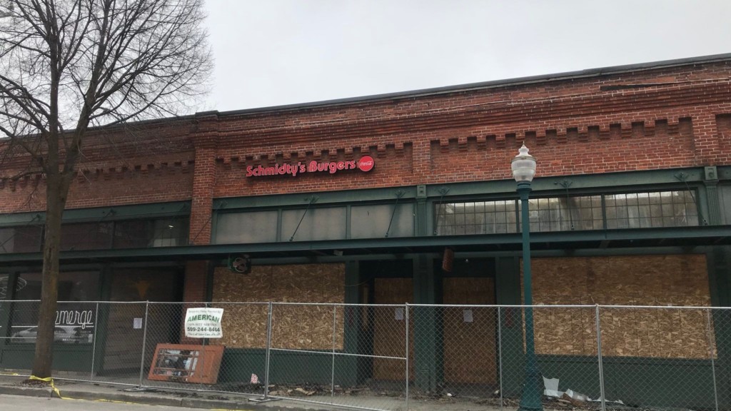 Bars are up outside of Schmidty's burgers after it was damaged by fire