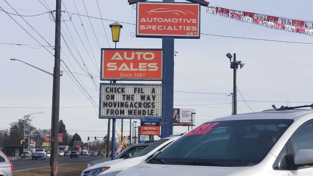 Automotive specialties sign reads announces chick-fil-a site