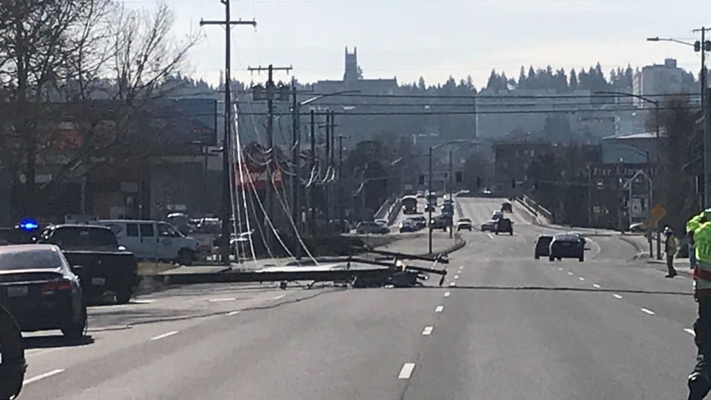 An electrical explosion brings down a powerpole on Division