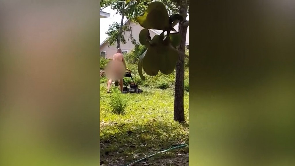 Teacher wants job back after he’s caught mowing yard naked