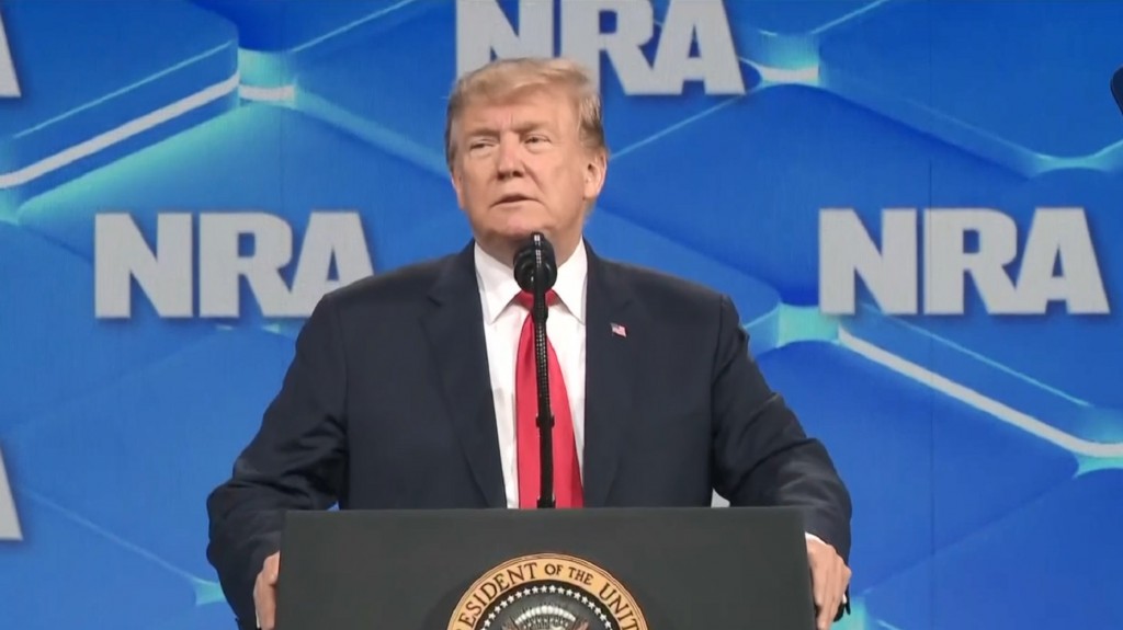 Trump cements stance on background checks in NRA call