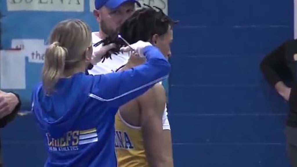 Referee in wrestler haircut controversy suspended for two years
