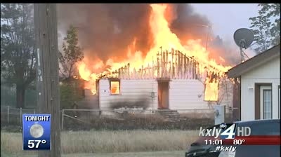 Brush fire destroys three East Spokane buildings
